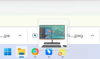 Win11如何将图片拖拽任务栏的软件里？
